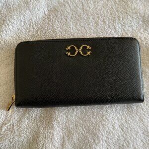 C. Wonder by Christian Siriano black leather wallet